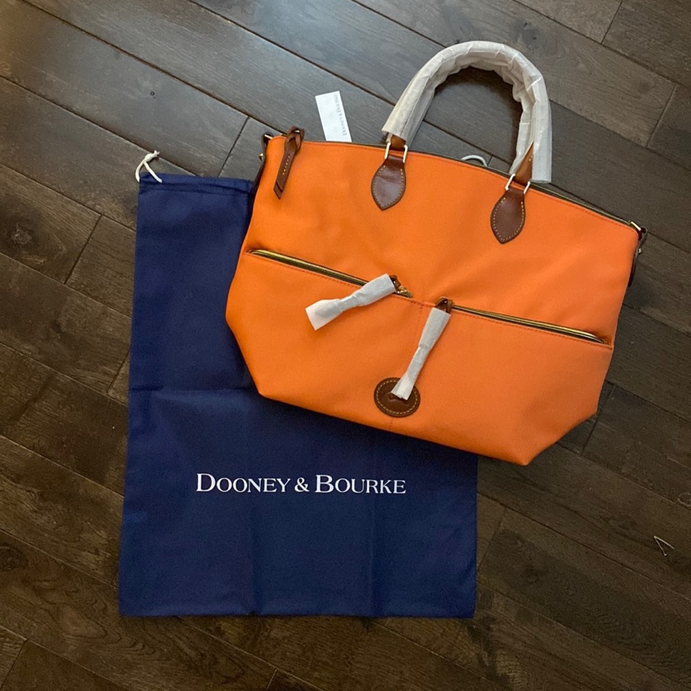 Dooney and bourke large pocket satchel in tangerine orange